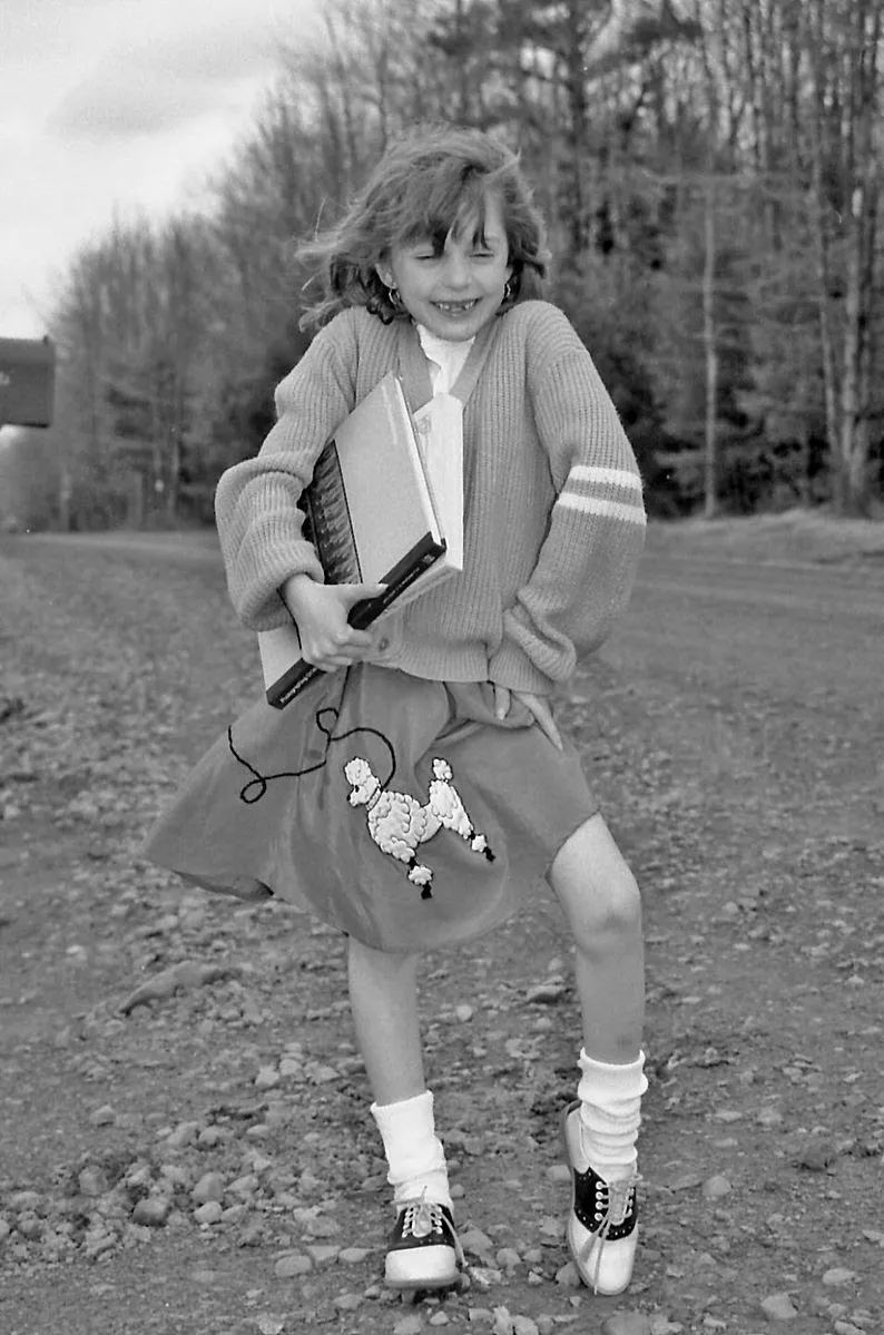 Girl wearing poodle skirt